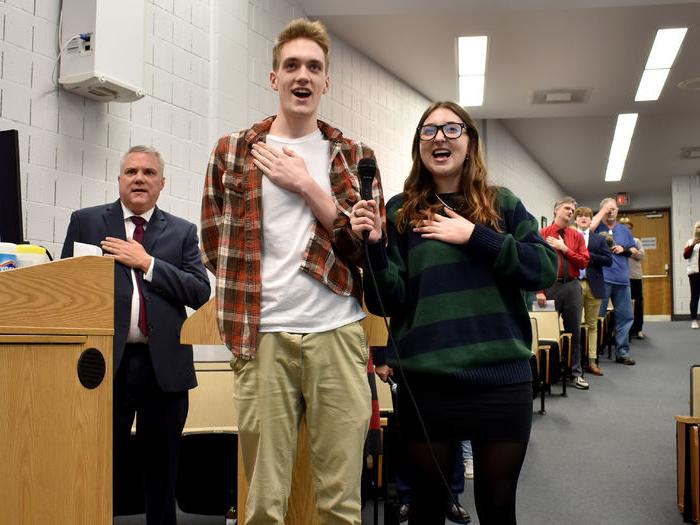 Rowan Mattern, left, and Gavin Taylor from Clearfield Area lead the audience in the signing of the national anthem during the annual Senior Scholastic Challenge, held at Penn State DuBois.